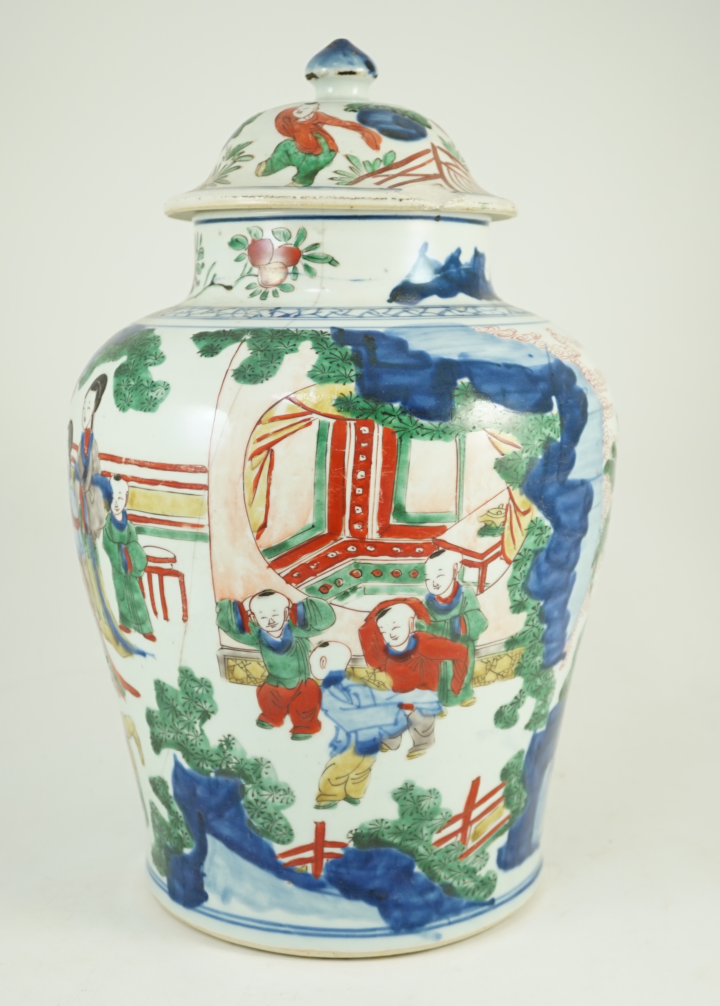 A Chinese Transitional wucai 'boys' vase and cover, c.1640, 41cm high